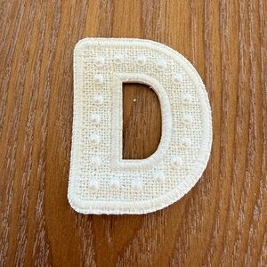 Pearl D letter patch